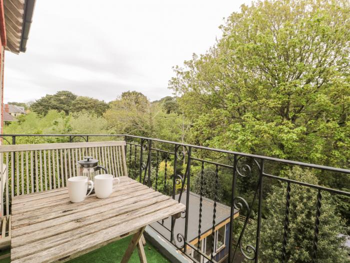 The Moorings, Bournemouth. First-floor apartment. Two bedrooms. Outlook over trees and pet-friendly