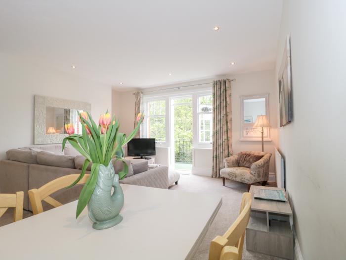 The Moorings, Bournemouth. First-floor apartment. Two bedrooms. Outlook over trees and pet-friendly