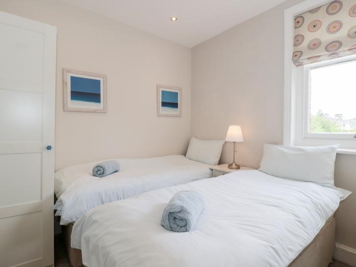 The Moorings, Bournemouth. First-floor apartment. Two bedrooms. Outlook over trees and pet-friendly