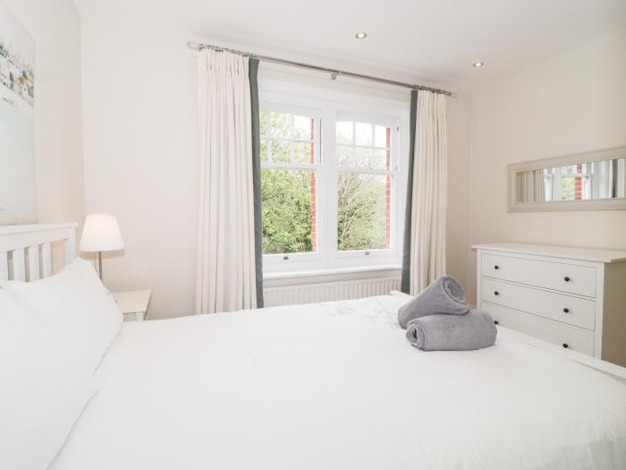 The Moorings, Bournemouth. First-floor apartment. Two bedrooms. Outlook over trees and pet-friendly