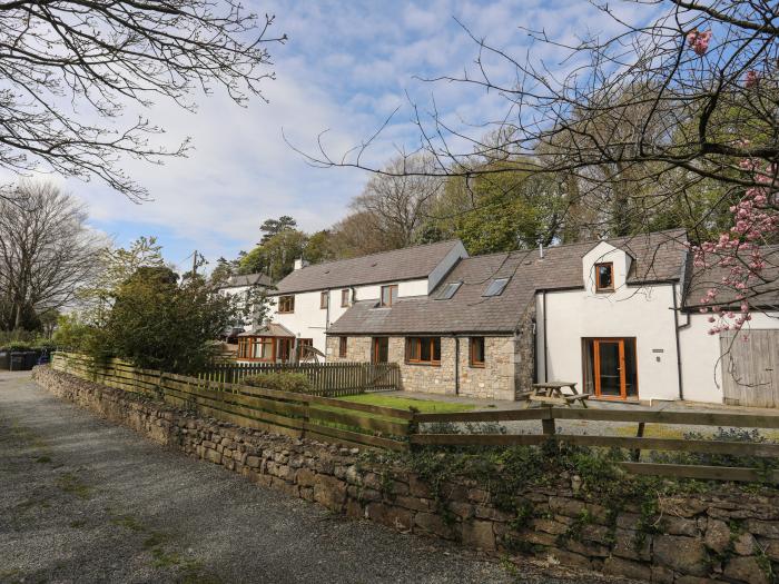 Long Cottage, Beaumaris, Anglesey. Two-bedrooms, off-road parking, enclosed garden and beach nearby.