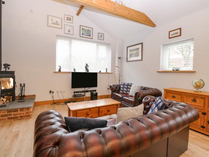 Primose Cottage, Cromer, Norfolk sleeps four guests in two bedrooms. Three pets, woodburner, parking