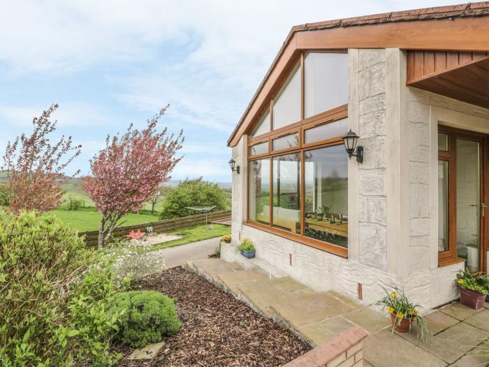 Laird House, Lochmaben, Dumfries and Galloway. Two-bedroom home with woodburning stove. Pet-friendly