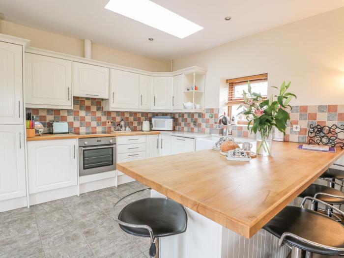 Laird House, Lochmaben, Dumfries and Galloway. Two-bedroom home with woodburning stove. Pet-friendly