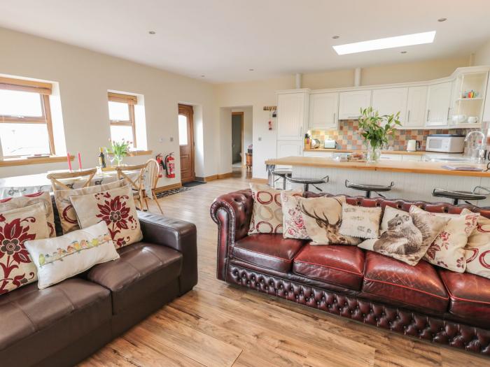 Laird House, Lochmaben, Dumfries and Galloway. Two-bedroom home with woodburning stove. Pet-friendly