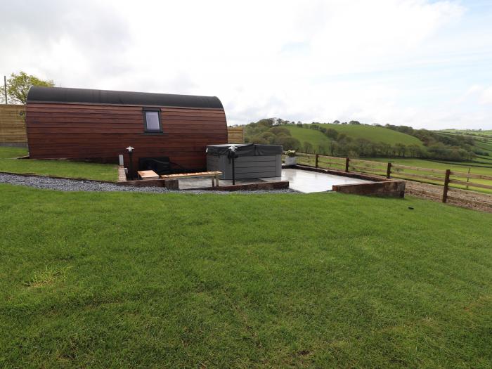 Ceunant near Aberystwyth, in Ceredigion. Single-storey home with hot tub and enclosed garden. 1 bed.