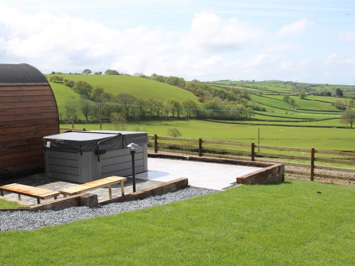 Ceunant near Aberystwyth, in Ceredigion. Single-storey home with hot tub and enclosed garden. 1 bed.