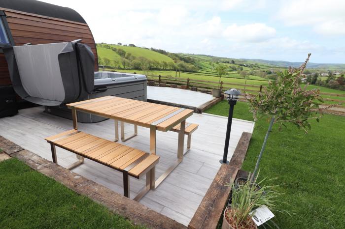 Ceunant near Aberystwyth, in Ceredigion. Single-storey home with hot tub and enclosed garden. 1 bed.
