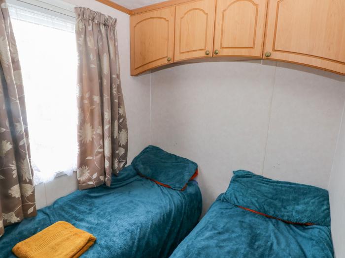 Park Lane near Kilgetty in Pembrokeshire sleeps six in three bedrooms. Family-friendly. Pet-friendly