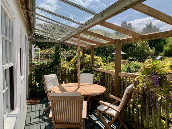 Wisteria Suite is in Dittisham, Devon, designated parking for 2 cars, pet-friendly, private decking.