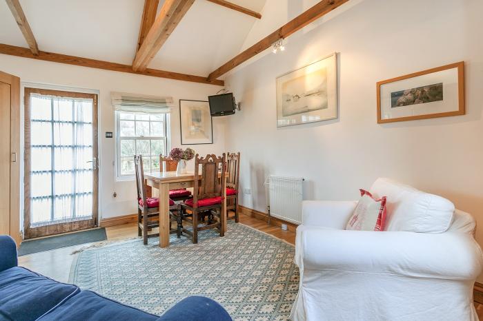Wisteria Suite is in Dittisham, Devon, designated parking for 2 cars, pet-friendly, private decking.