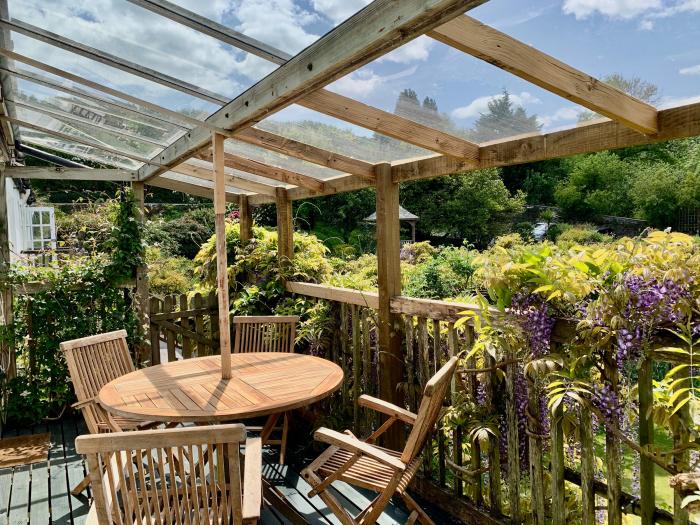 Wisteria Suite is in Dittisham, Devon, designated parking for 2 cars, pet-friendly, private decking.