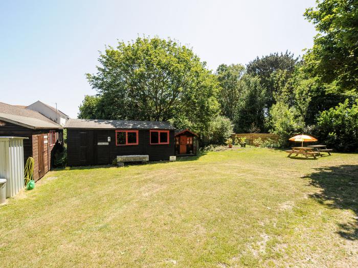 Barn Cottage, Mullion, Cornwall. Three bedrooms. Pet-friendly. Lawned garden. 2 x communal paddocks.