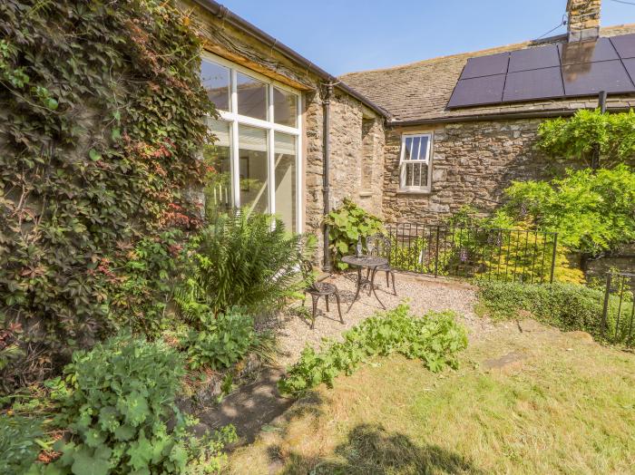 The Hay Loft is in Kendal, Cumbria. Off-road parking. Enclosed garden. Woodburning stove. 2bed.