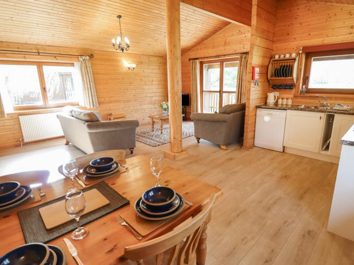 Tawny Lodge in Stainfield, Lincolnshire, sleeps four guests in two bedrooms. Pets & off-road parking