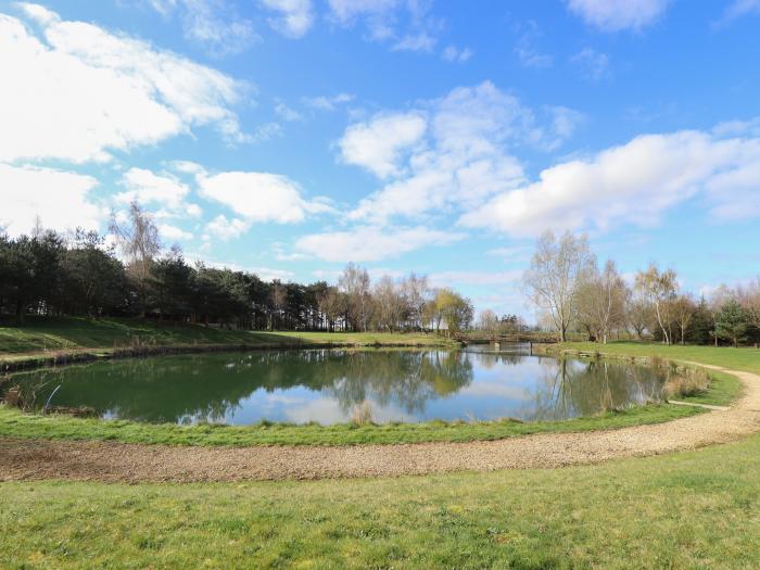 Badger Lodge in Stainfield in Lincolnshire, sleeps four in two bedrooms. Off-road parking and pets.