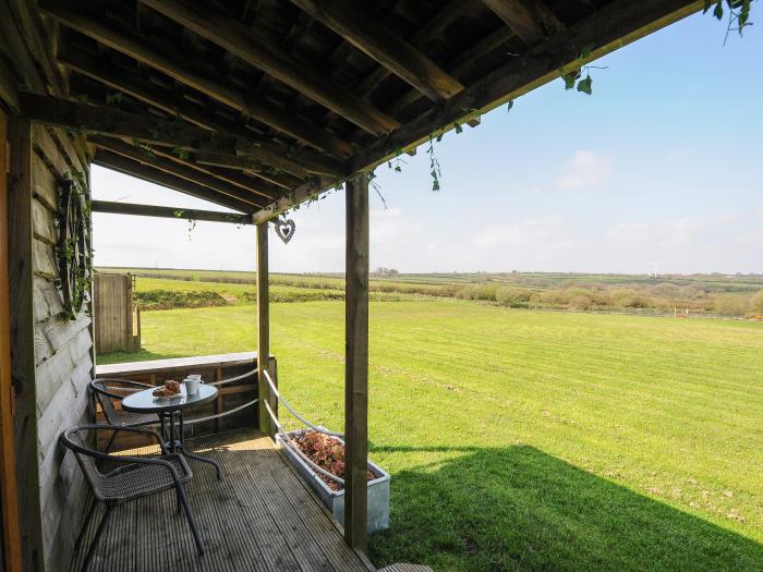 The Cabin rests in Jacobstow, Cornwall, Romantic, Idyllic location, lake, beautiful views, pet-free.