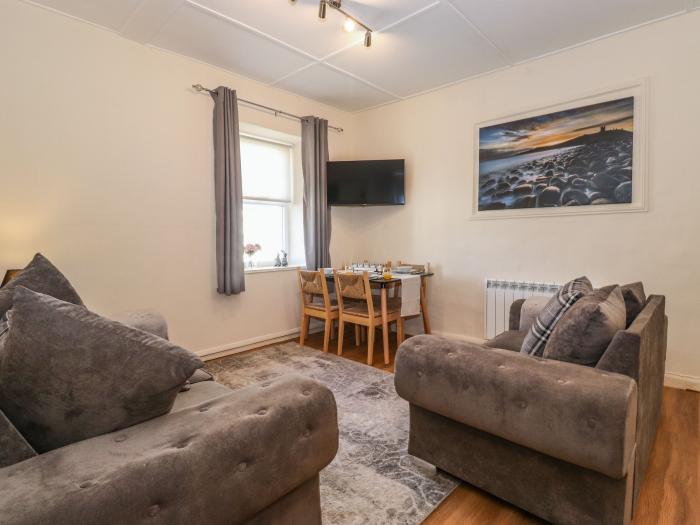 The Butchers Flat in Seahouses, Northumberland. First-floor apartment, off-road parking, near beach.