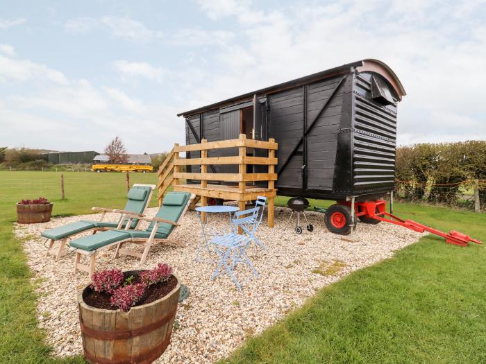 The Freight Wagon in Gretton Gloucestershire. Off-road parking, enclosed garden with barbecue, books