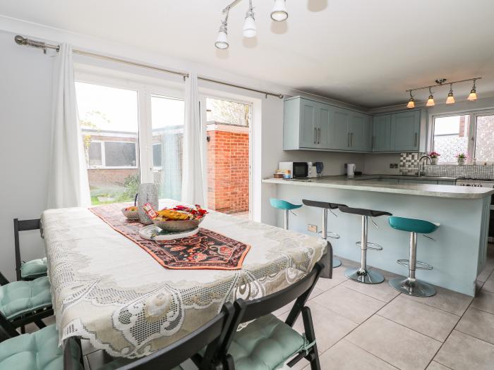 Alverstone Seaside near Gosport, Hampshire. Three-bedroom home set near amenities and coast. Garden.