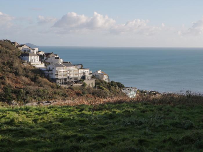 Looe Island View in Downderry, Cornwall, sea views, off-road parking, enclosed garden, dog-friendly.