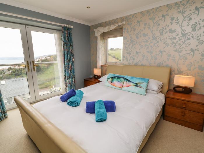 Looe Island View in Downderry, Cornwall, sea views, off-road parking, enclosed garden, dog-friendly.