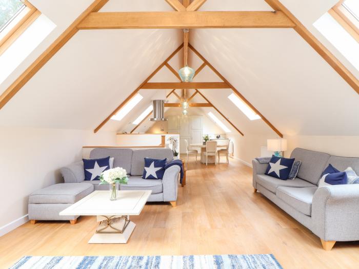 Potters Barn in Helston, Cornwall. Pet-friendly. Stone-built conversion. Reverse level. Two bedrooms