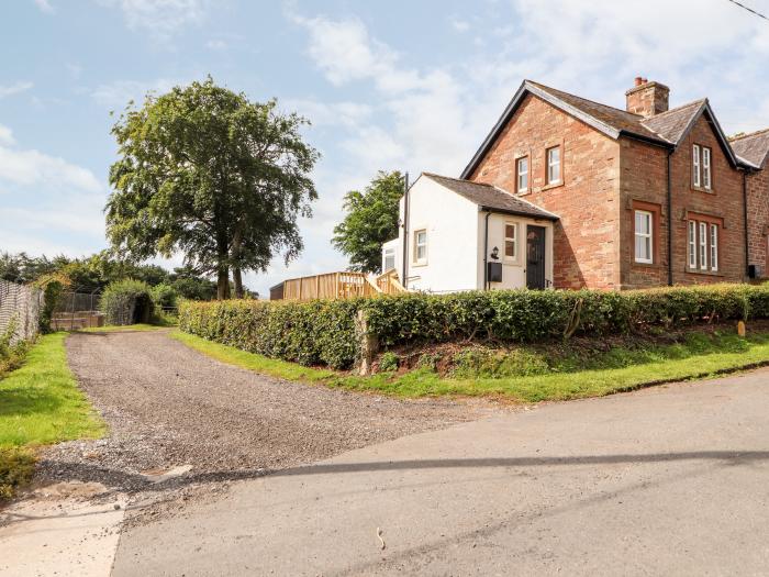 Rose Bank Cottage in Dalston, Cumbria. Three-bedroom home, with private sun terrace. Countryside.