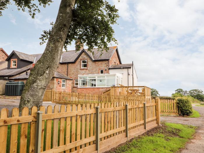 Rose Bank Cottage in Dalston, Cumbria. Three-bedroom home, with private sun terrace. Countryside.