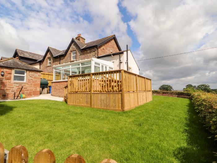 Rose Bank Cottage in Dalston, Cumbria. Three-bedroom home, with private sun terrace. Countryside.