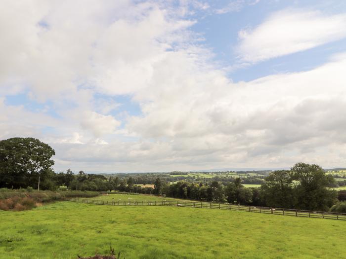 Rose Bank Cottage in Dalston, Cumbria. Three-bedroom home, with private sun terrace. Countryside.