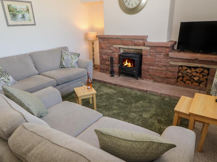 Rose Bank Cottage in Dalston, Cumbria. Three-bedroom home, with private sun terrace. Countryside.