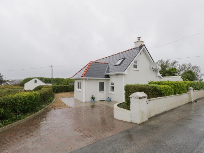 Ballinakill near Lettermore, County Galway. Ground-floor, contemporary cottage with garden. One dog.
