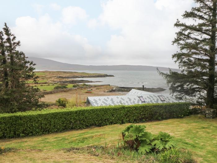 Whispering Pines in Kilcrohane, County Cork. Five-bedroom home enjoying panoramic sea views. Garden.
