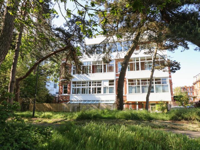 The Pines in Bournemouth in Dorset. First-floor apartment with woodland and sea views. Two bedrooms.