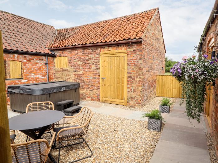 The Grange Cottage 2 in Ashby-cum-Fenby near Waltham, Lincolnshire. Hot tub. Near an AONB. Open plan