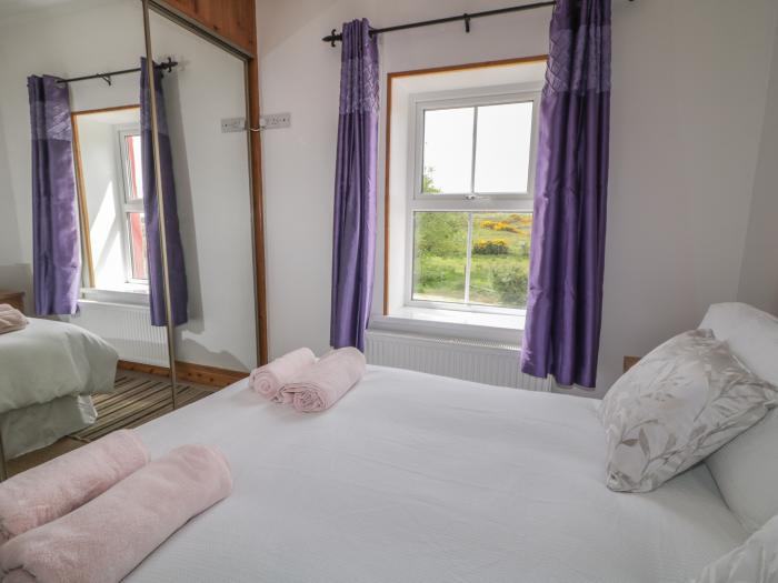 Cooladerry Cottage is in Cooladerry Mountain near Portsalon, County Donegal. Off-road parking. 3bed.