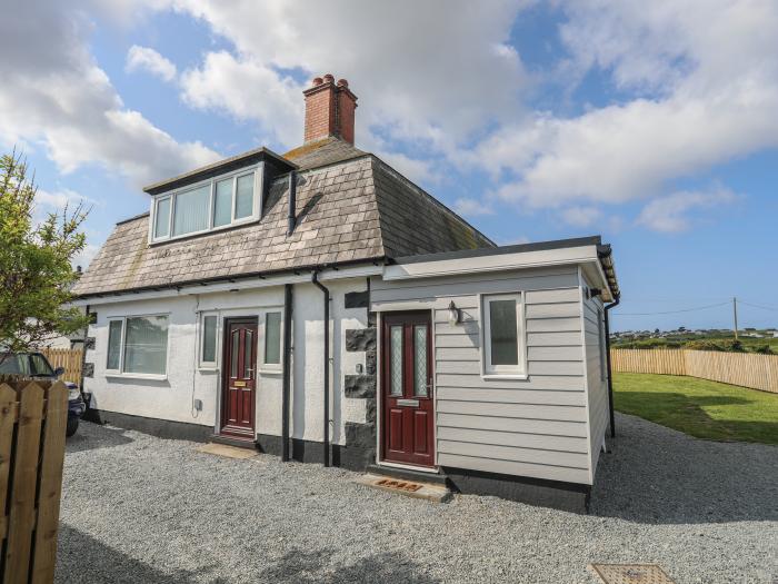 Station House, Rhosneigr, Anglesey. Off-road parking. Enclosed garden. Close to amenities and beach.