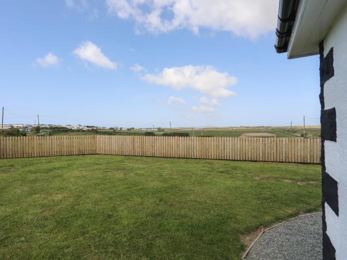 Station House, Rhosneigr, Anglesey. Off-road parking. Enclosed garden. Close to amenities and beach.