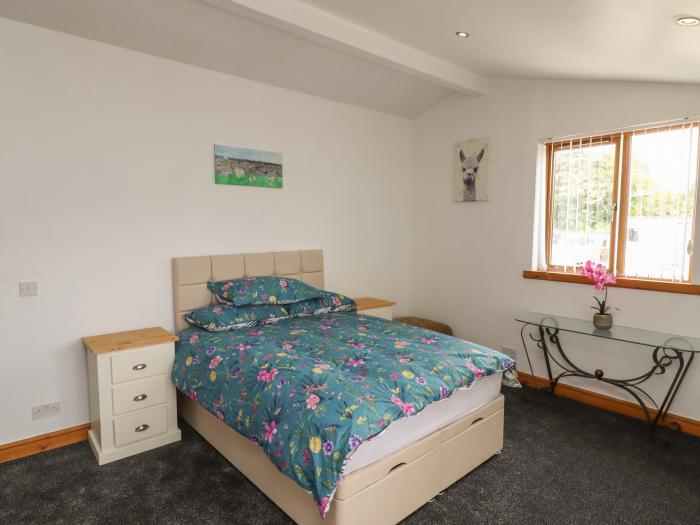 Tilly's Lodge in Tickhill, South Yorkshire, off-road parking, woodburning stove, close to amenities.
