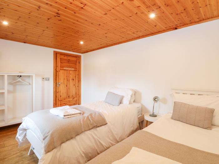 Harmony House near Belton in Norfolk. Two-bedroom, stylish lodge with on-site swimming pool and golf