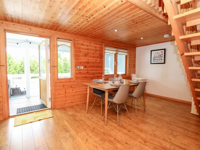 Harmony House near Belton in Norfolk. Two-bedroom, stylish lodge with on-site swimming pool and golf