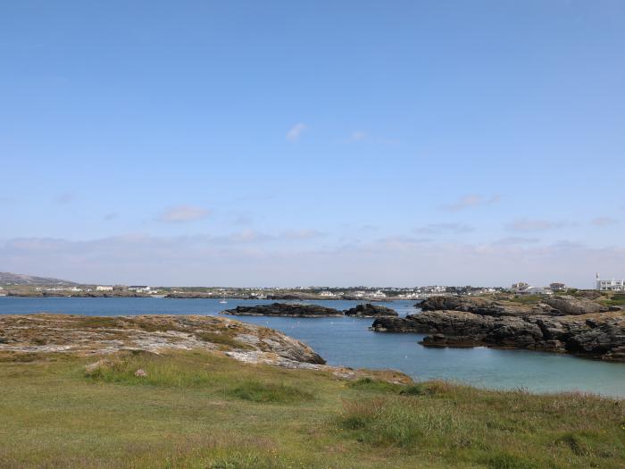 The Cove, Trearddur Bay, Anglesey. Close to a shop, a pub and a beach. Off-road parking for 2. WiFi.