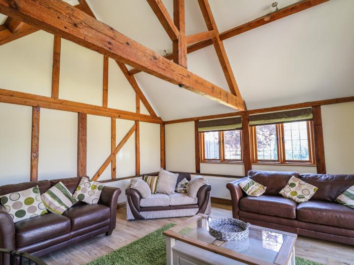 Awelfan is near Bettws Cedewain, Powys. Three-bedroom, barn conversion. Hot tub and enclosed garden.