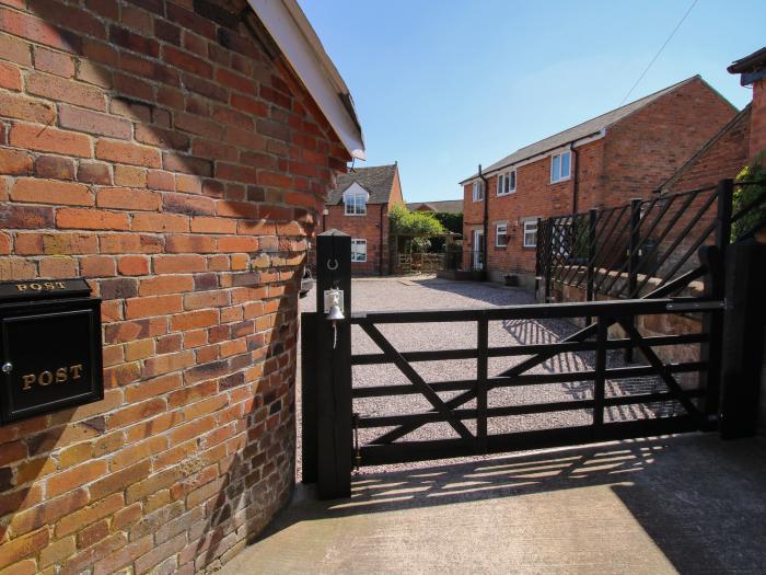 The Coach House At The Gables, is in Burlton, Shropshire. Close to pub and AONB. Garden and parking.