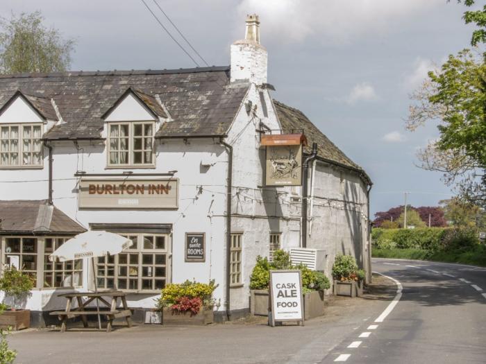 The Coach House At The Gables, is in Burlton, Shropshire. Close to pub and AONB. Garden and parking.