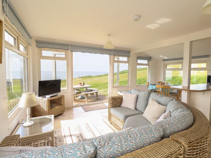 Siesta Chalet in Eype, Dorset. Open-plan living. Coastal location. Sea views. Child-friendly. 2-bed.