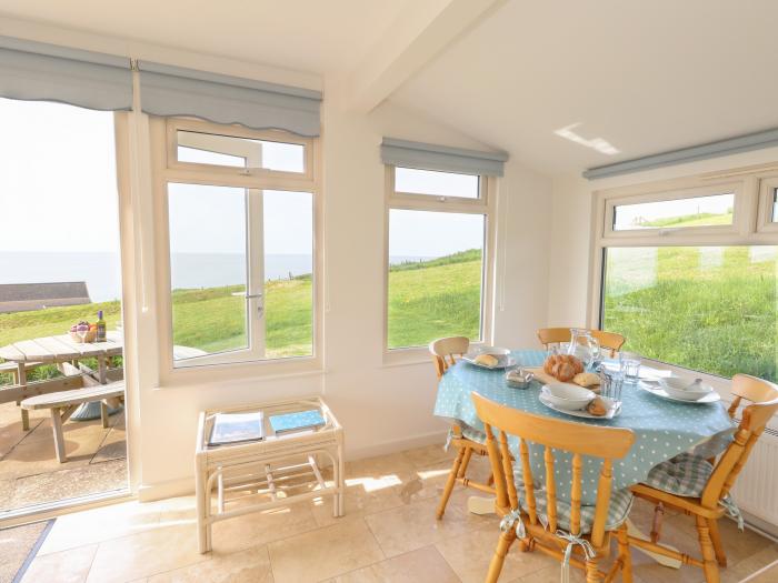 Siesta Chalet in Eype, Dorset. Open-plan living. Coastal location. Sea views. Child-friendly. 2-bed.