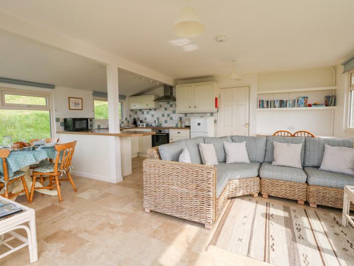 Siesta Chalet in Eype, Dorset. Open-plan living. Coastal location. Sea views. Child-friendly. 2-bed.