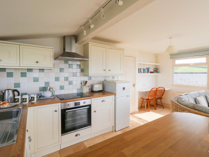 Siesta Chalet in Eype, Dorset. Open-plan living. Coastal location. Sea views. Child-friendly. 2-bed.